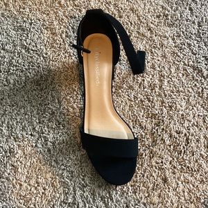 Black short heal perfect for a dance or wedding, been worn only a few times